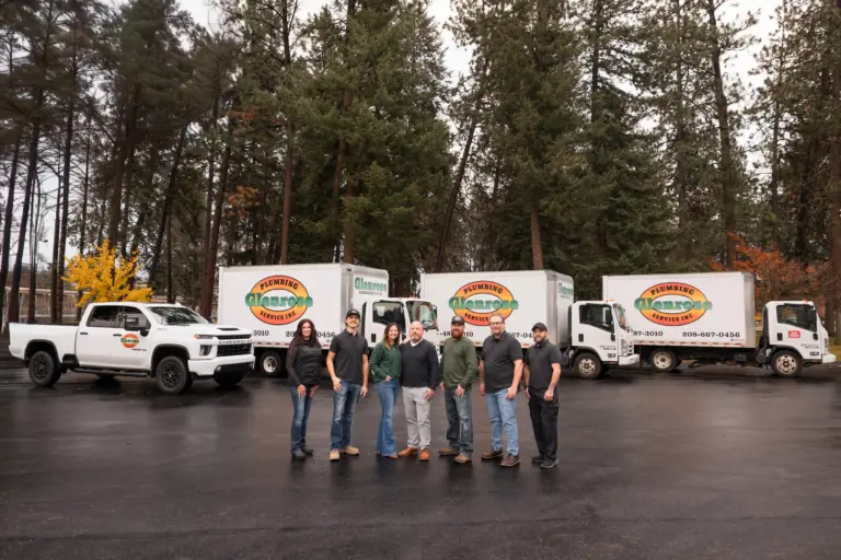 A photo with the entire GLenrose team, plumbers, dispatch, & owners