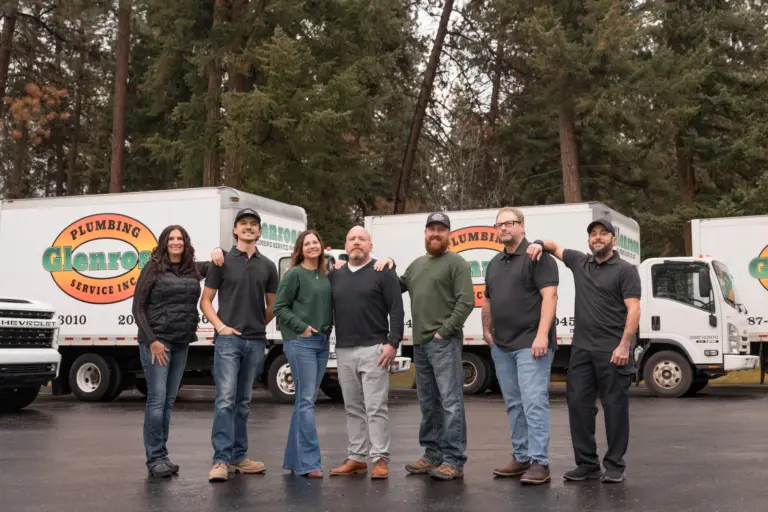 A photo with the entire GLenrose team, plumbers, dispatch, & owners