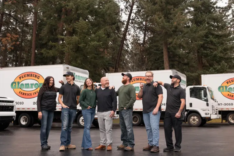 A photo with the entire GLenrose team, plumbers, dispatch, & owners