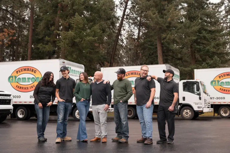 A photo with the entire GLenrose team, plumbers, dispatch, & owners